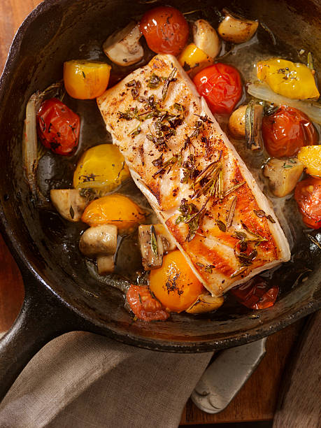 istock Grilled Halibut Fillet with Tomatoes and Mushrooms 521799776