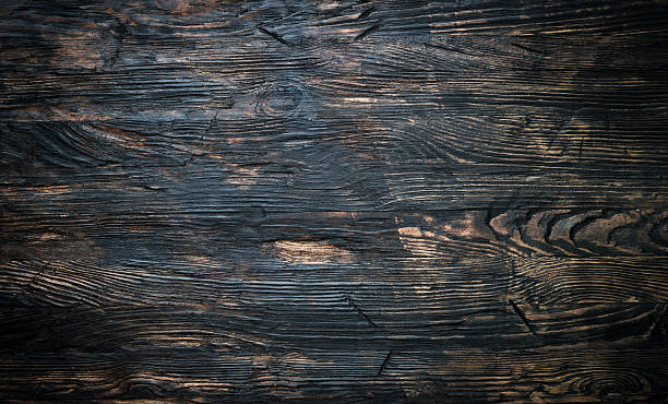 istock surface of dark wooden table 521800026