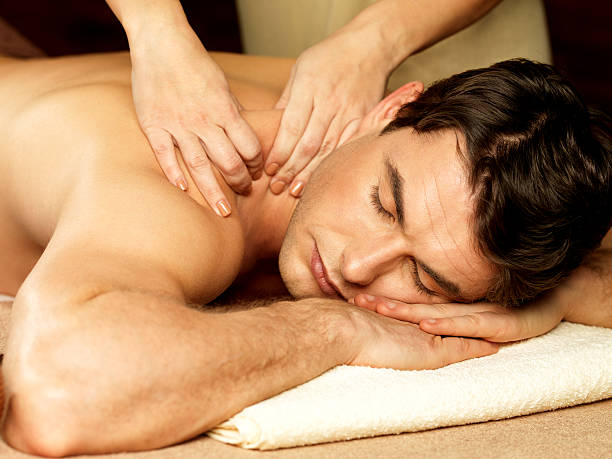 istock Man having massage in the spa salon 521800096