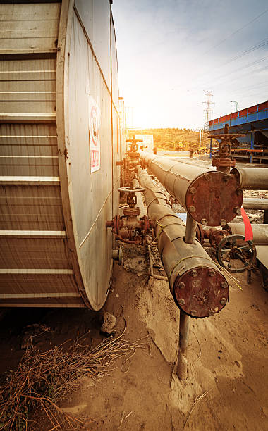 istock Oil and gas processing plant with pipe line valves 521800175