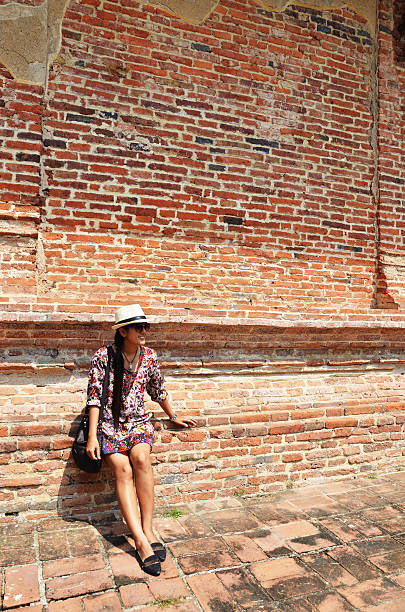 istock Thai woman portrait at Brick wall Background 521800897