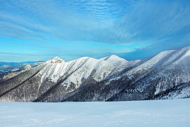 istock Beautiful mountains view at winter under sky. 521801362