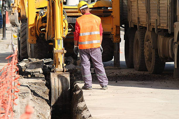 Excavation On Asphalt Road Excavation On Asphalt Road trench stock pictures, royalty-free photos & images