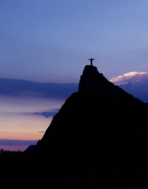 Christ the Redeemer in the Evening Sunlight 
Christ the Redeemer Statue on top of Corcovado hill in the evening sunlight, Rio de Janeiro, Brazil.
 cristo redentor rio de janeiro stock pictures, royalty-free photos & images