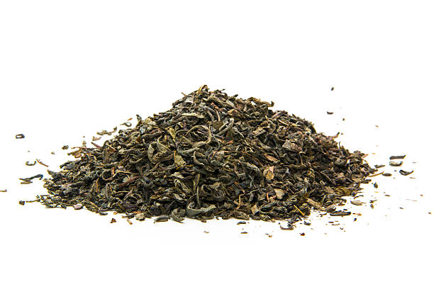 Heap of dry tea. Isolated on white background stock photo