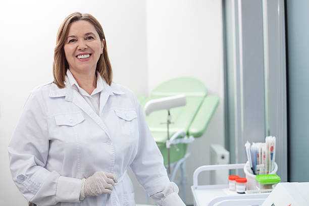 istock Cheerful female doctor is working with joy 521804568