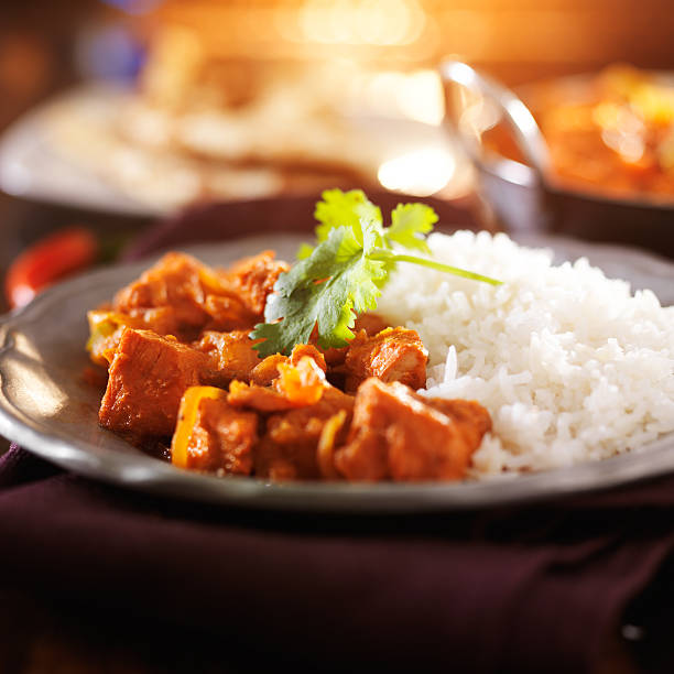 istock plate of indian chicken vindaloo curry with rice 521804621