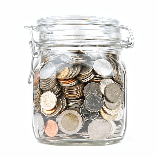 istock Money box coins stack thai baht isolated on white background 521805394