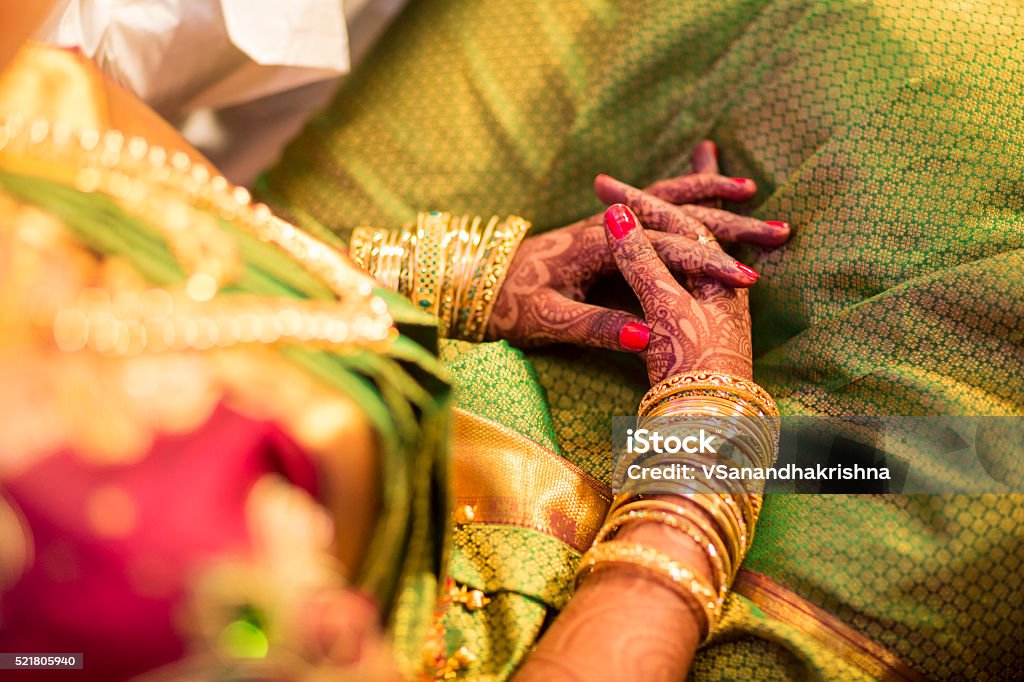 beautifully decorated Indian bride hands Mehndi, application of henna as skin decoration in Indian Wedding. India Stock Photo