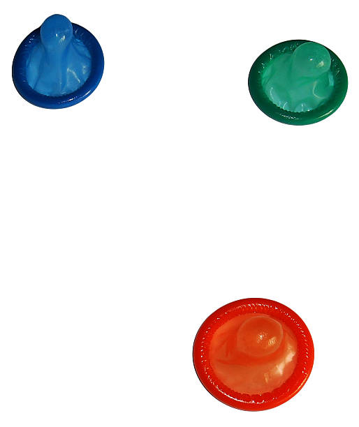 istock Colorful condoms isolated on white background 521807769