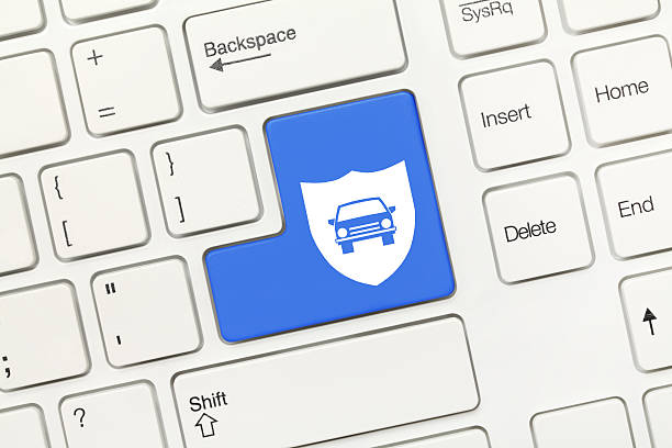 istock White conceptual keyboard - Key with shield and car symbols 521808448