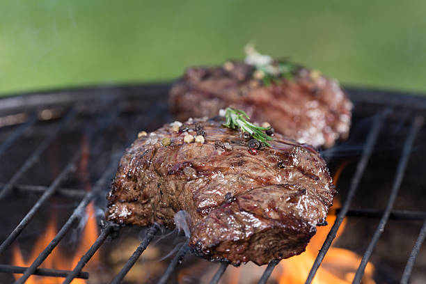 istock Tasty meat on garden grill 521808548
