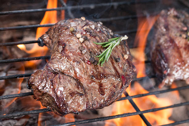 istock Tasty meat on garden grill 521808638