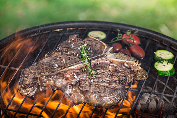 istock Tasty meat on garden grill 521808718