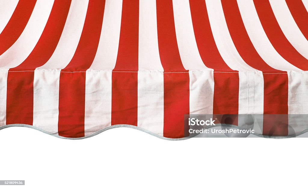Red white striped awning overhang This is a red white striped awning overhang. Awning Stock Photo