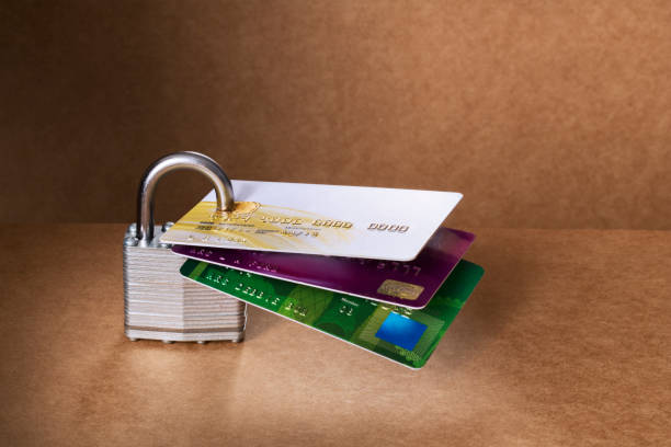 istock Credit cards attached to padlock 521811303