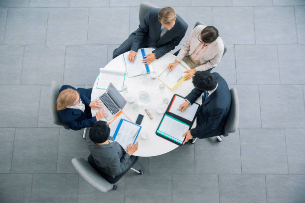 istock Business people having meeting at table 521811423