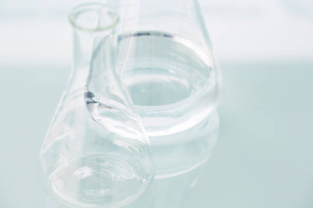 istock Close up of empty beakers on counter in lab 521811487