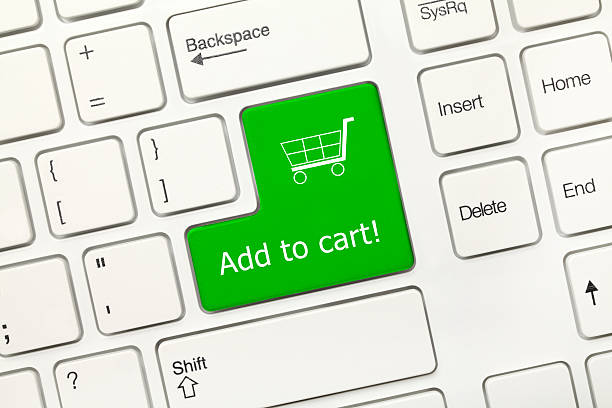 istock White conceptual keyboard - Add to cart (green key) 521811828