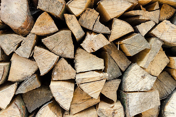 istock Firewood stacked. Close-up 521811940