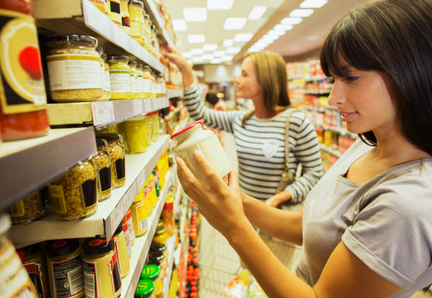 istock Women shopping in grocery store 521812103