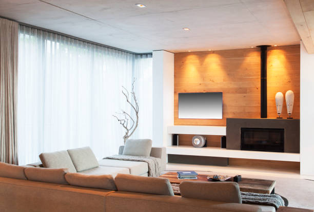 istock Sofas, curtains and fireplace in modern living room 521812311