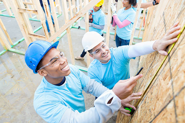 istock Men work on charity home together 521812678