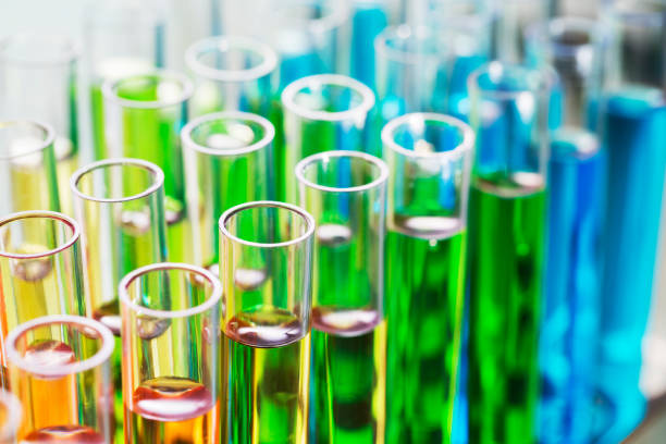 istock Close up of rack of test tubes with solution 521813119