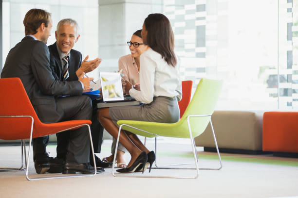 istock Business people having meeting in office building 521813421