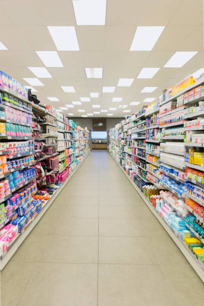 istock Grocery store aisle and fluorescent lighting 521813585