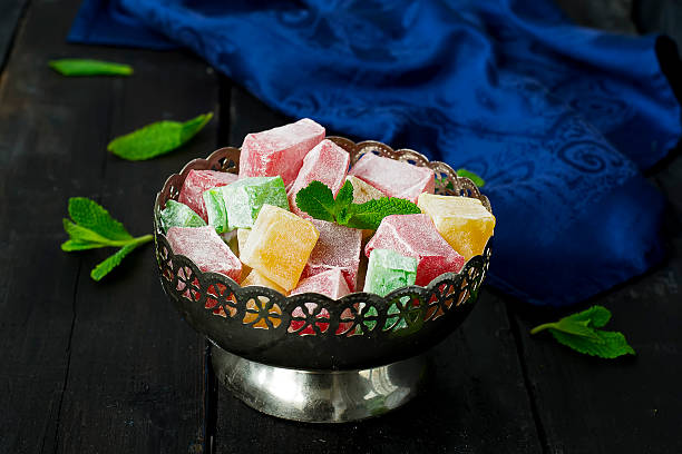 istock lokum - traditional Turkish sweets on a dark background 521814354