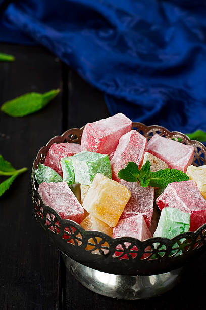istock lokum - traditional Turkish sweets on a dark background 521814394