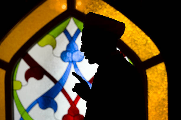 mullah prays Russia, Moscow, 27 of March 2016: Mullah prays in the Moscow Cathedral mosque during Quranic Festival in Moscow, Russia mullah photos stock pictures, royalty-free photos & images