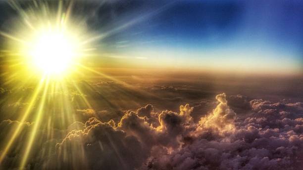 istock Beautiful Round Sun Burst Sunset Beams Above Cloudscape 521815162