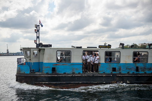 ferry connecting rio x niteroi in rio de janeiro brazil - 01 january 2010: passengers arriving at the ferry that travels in guanabara bay between the cities of rio de janeiro and niteroi.