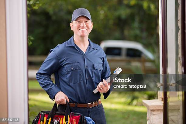 Service Industry Repairman At Customers Front Door Stock Photo - Download Image Now