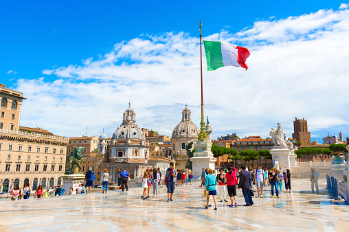 Rome, Italy - September 1, 2014: Piazza Venezia one of the nerve centres of Rome, and important hub of city traffic and stop off point for tourists. Main attraction is monument to Victor Emanuel II