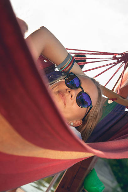 istock Girl Relaxing In Hammock 521818863