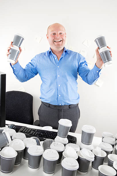 istock Happy businessman addicted to coffee 521818949