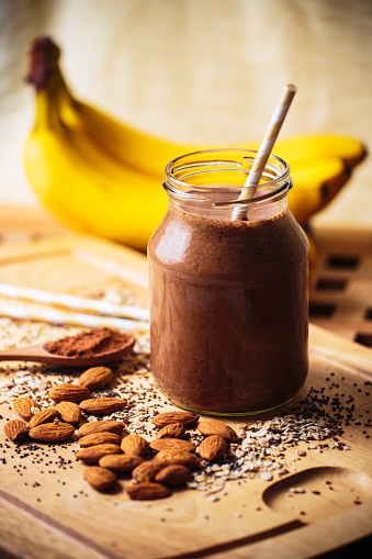 Banana cocoa smoothie in a glass jar