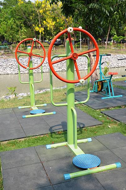 istock fitness equipment in public park 521822547