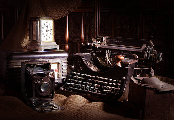 Old typewriter, retro camera and radio receiver stock photo