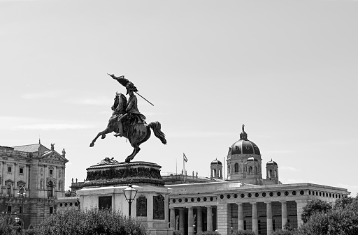 Equestrian statue of Archduke Charles of Austria in Heldenplatz near the Hofburg Palace in Vienna, with the dome of the Museum of Art History in the background. Toned.
