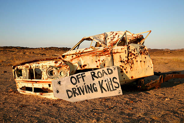 istock Sign saying off road driving kills on wreck 521831627