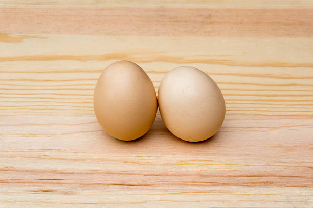 istock natural organic eggs on wood 521835351
