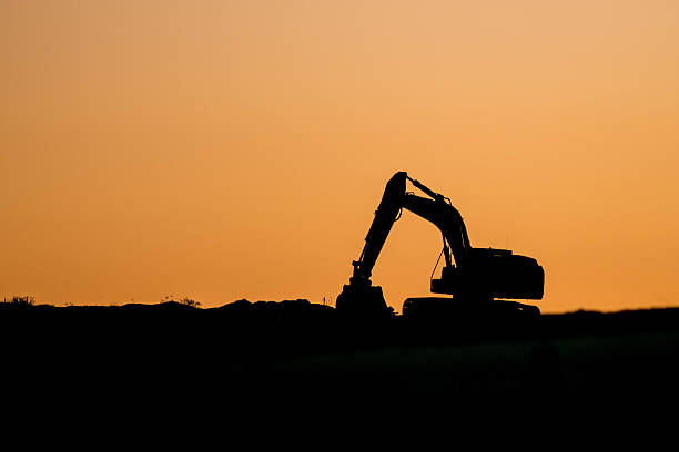 istock Silhouette of a Tractor or Earth Mover 521849287