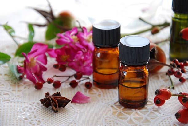 istock essential oils with rose hips and flowers 521852989