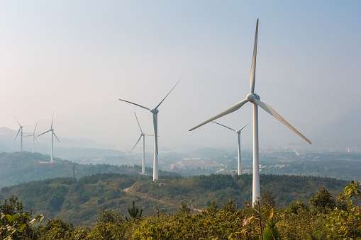 wind farm - new energy in fog and haze