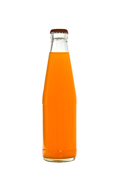istock Orange juice glass bottle. Isolated on white background 521855517