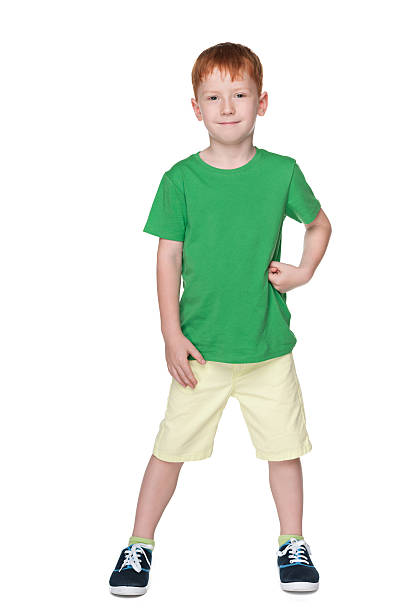 istock Young smiling boy in a green shirt 521855777